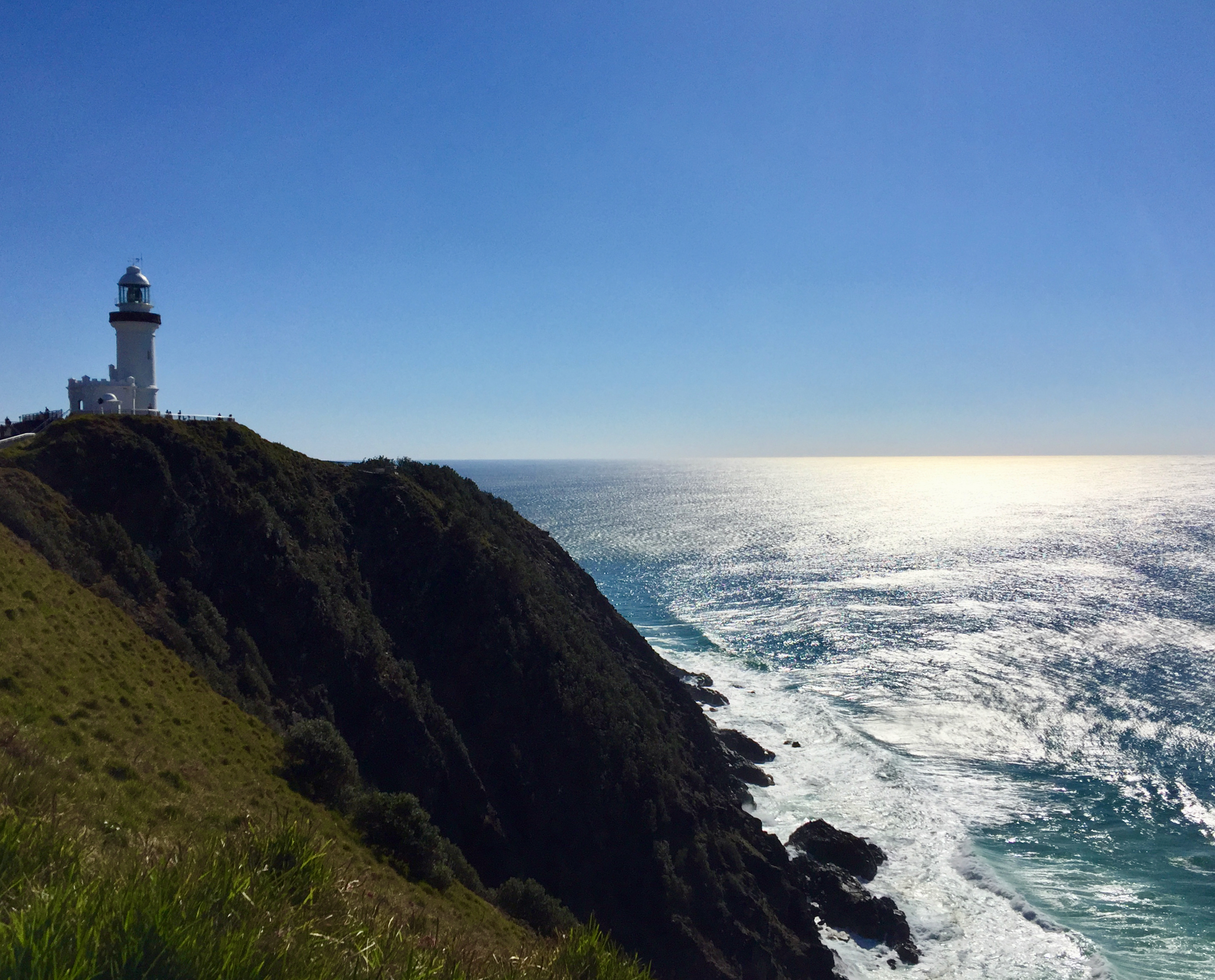 Lighthouse on a coastal cliff overlooking the ocean